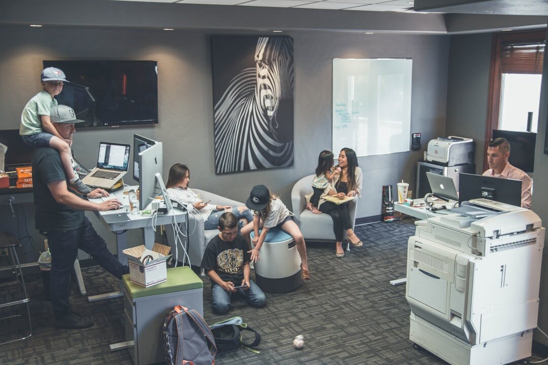 Diverse editorial team working together in a modern newsroom office