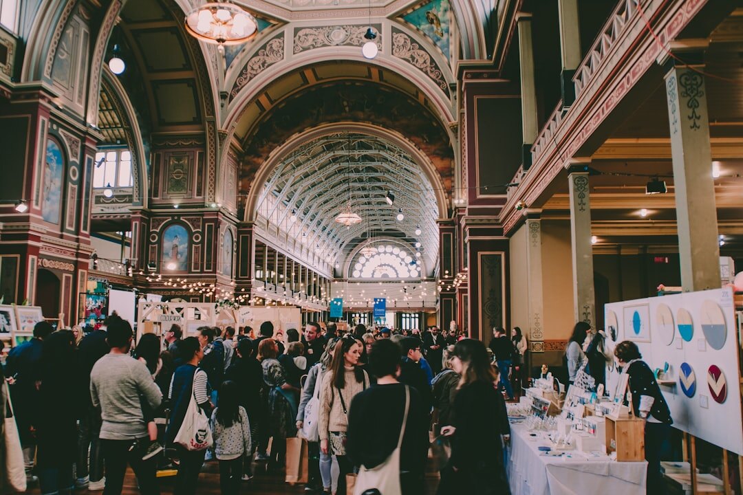 Business professionals networking during a summit break